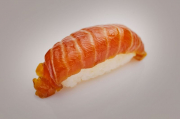 Salmon nigiri in hot teriyaki sauce
